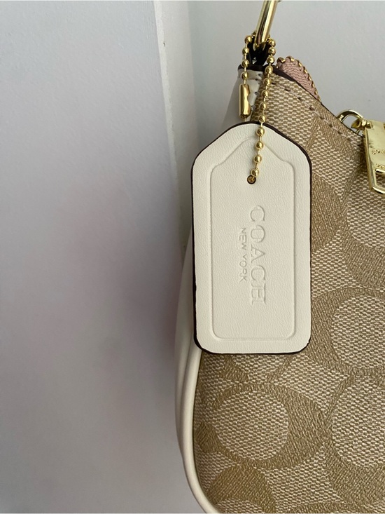 Coach Handbags - Coach Beige Signature Canvas Crossbody Bag